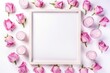 Frame with rose flowers around and candles on white background. Flat lay, top view, copy space, Valentine's day, Mother's day, Women's Day and love concept
