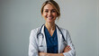 © The A.I Studio - portrait of happy smiling female doctor with arms crossed on a white background
