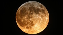 A Close Up Of A Full Moon In The Night Sky With A Black Sky In The Back Ground And A Black Sky In The Background.