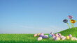 © Alextra - easter eggs on a meadow blue sky background 3D rendering