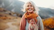 © Wolfilser - portrait of middle aged happy woman enjoying nature