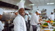 © Kondor83 - Smiling African American chef in restaurant kitchen