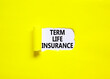 Term life insurance symbol. Concept words Term life insurance on beautiful white paper. Beautiful yellow paper background. Medical term life insurance concept. Copy space.