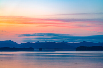Wall Mural - landscape of mountain, island in sea with amazing sunset with dramatic color sky