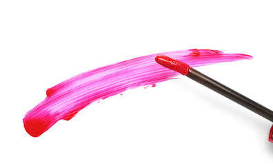 Brush with beautiful pink lipstick stroke on white background