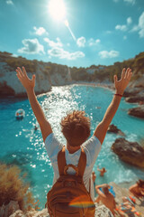 A beautiful boy with a backpack, excited for a summer vacation by the turquoise ocean.