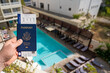 Man holding USA passport and airline ticket.