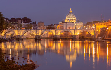 Wall Mural - Bridge of the Holy Angel in Rome at night illuminated at sunset.