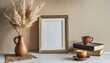 empty wooden picture frame mockup hanging on beige wall background boho shaped vase dry flowers on table cup of coffee old books working space home office art white room with a table