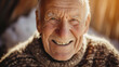 A heartwarming portrait of an elderly man in his 80s radiating joy with his wide, toothy smile. His thinning hair adds a touch of wisdom, while his cozy attire reflects comfort and contentme