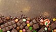 dark chocolate background sweet bar and candy with empty space for text