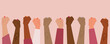 © Pixel-Shot - Many female hands with clenched fists on pink background. International Women's Day