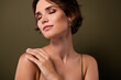 © Beauty Hero - Photo of attractive pretty girl with closed eyes touch tender gentle arm skin over green color background