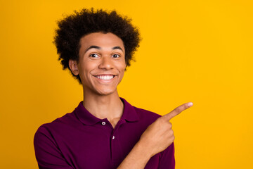 Sticker - Photo of glad nice man wear stylish purple polo clothes recommend buy cool product isolated on yellow color background