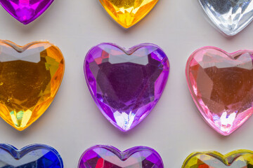 Wall Mural - heart shape jewelry sticker decorated on white paper background