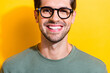 Cropped photo of funky cheerful guy wear khaki t-shirt spectacles smiling white teeth isolated yellow color background