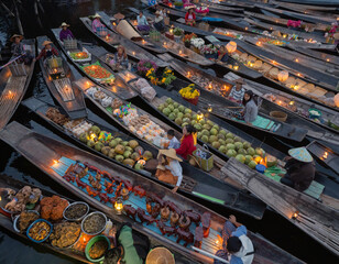 Damnoen Saduak Floating Market or Amphawa. Local people sell fruits, traditional food on boats in canal, Ratchaburi District, Thailand. Famous Asian tourist attraction destination. Festival in Asia.