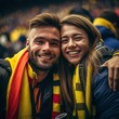 colombian man and woman couple hugging each other standing at cricket stadium