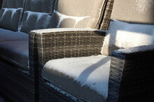 Snow On Garden Furniture Cushions Made Of Waterproof And Heat-resistant Fabric