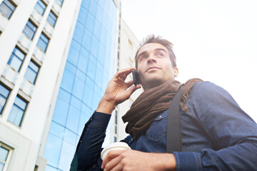 Poster - Man, smartphone and smile in city for phone call, conversation or networking in Los Angeles. Male person, technology and confidence with communication, contact and happy in morning from low angle