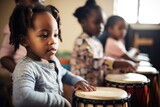 Fototapeta  - shot of a young children learning music in a class