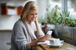 © Hover/peopleimages.com - Phone, happy and woman with drink in coffee shop online for social media, text message and internet. Restaurant, cafe and person on smartphone laugh for website, reading blog and chat with cappuccino