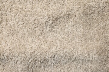 Poster - Texture of soft beige fabric as background, top view