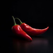 Two Red Chili Peppers on a Dark Background: The Spice of Minimalism