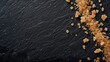 Black slate background with brown cane sugar
