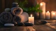 Сandles, stones and towel in a spa, Burning candles, stones and towel on massage table