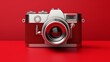A striking visual of a vintage silver and red retro photo camera elegantly isolated on a vibrant red background 