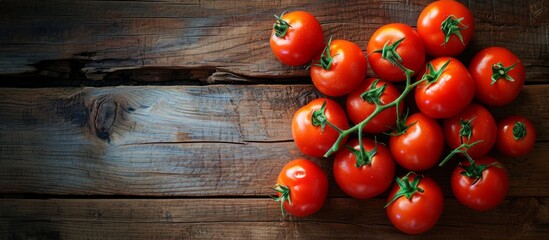 Wall Mural - Fresh tomatoes displayed on a wooden background with space for text.