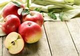 Fototapeta Tulipany - organic red apples on wooden table