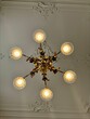 golden chandelier on white ceiling renaissance