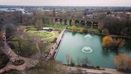 Idyllic scene of a tranquil park featuring numerous fountains in Chelmsford, England