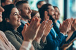 © ArtisticLens - Applause support and success with a business team clapping as an audience at a conference or seminar Meeting wow and motivation with a group of colleagues or employees cheering on an achievement
