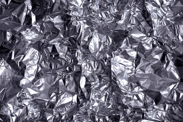  Texture of Crumpled Silver Foil. Silver Food Foil With Numerous Folds and Creases, With Strong Contrasting Light. Abstract Aluminium Background. Silver Metallic Layout.