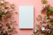 a mockup with a blank white book cover against a peach colored background