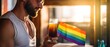 bearded man holding a glass of beer in lgbt style. Gay party with rainbow drinks