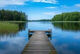 Fototapeta Na sufit - Perfect water view pier. Waterfront lake with small pier.