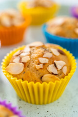 Poster - Lemon poppy seed muffins garnished with almond slivers