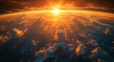 Fototapeta  - Nature's fiery masterpiece unfolds as the sun dips below the horizon, casting a warm glow over the clouds and illuminating the vastness of outer space