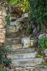 Wall Mural - Сlose-up stone steps in the ancient antique city. Stone steps of a staircase close-up.