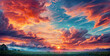 sunset with a sky on fire, orange and pink clouds contrasting with the blue sky, above a forest of green trees.
