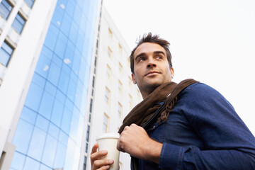 Canvas Print - Walking, thinking and man with coffee, city and ideas with daydreaming and cappuccino with urban town. Person, outdoor and guy with morning tea and latte with buildings and thoughts with sunshine