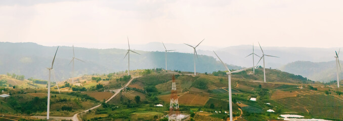 Wall Mural - eco energy energy concept windmill on the hill with sunset