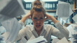 Stressed woman surrounded by piles of paper. Concept of being swamped with work or doing taxes