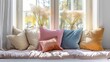 Spring's sorbet-toned pillows decorating a sun-kissed nook by the window