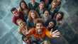 © Anastasiia - Diverse Friends Group Taking Selfie Together,   high-angle view of a cheerful, diverse group of friends reaching out for a selfie, showcasing joy and unity in a casual setting