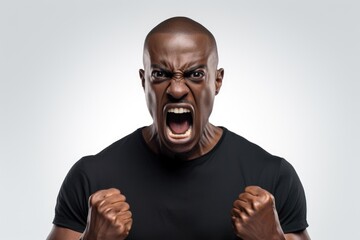Poster - A man wearing a black shirt is captured in the act of screaming. This intense image can be used to depict anger, frustration, or fear in various projects